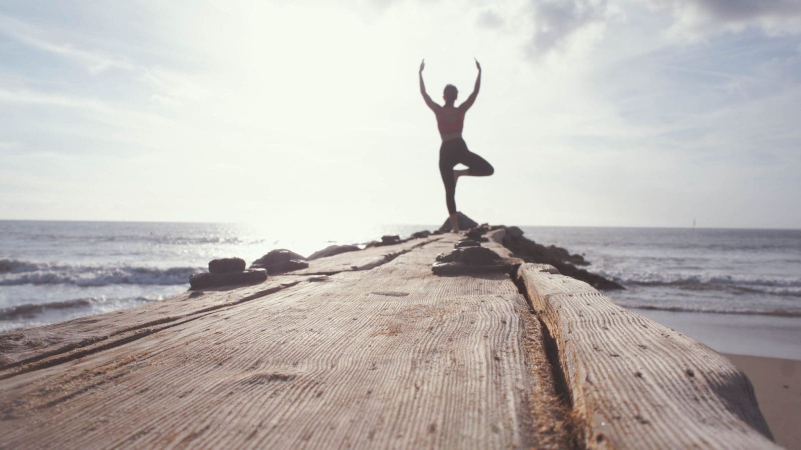 Yoga pose by the seaside